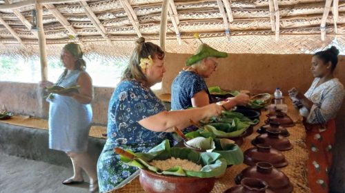 Traditional Sri Lankan rice and curry buffet served in clay pots during a village tour